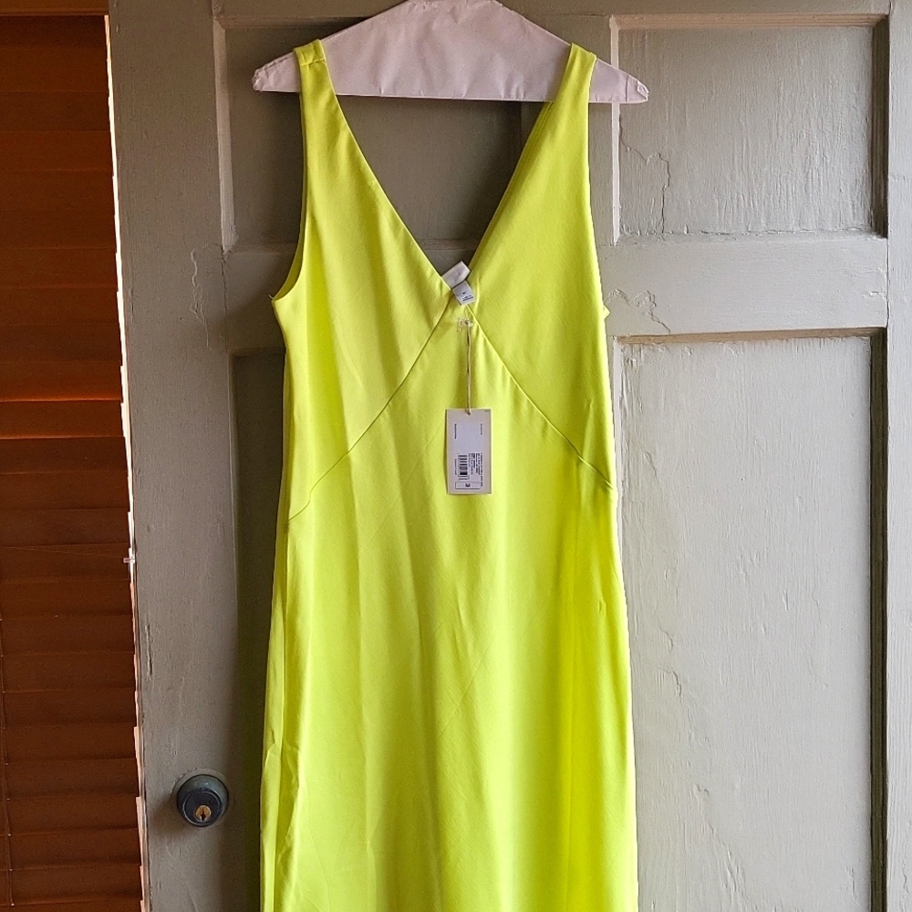 Neon green/yellow silky dress, two slits